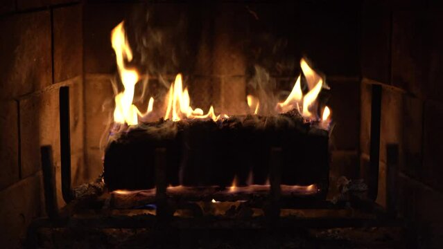 Cozy Fireplace with wax log close up