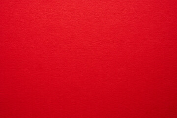Vivid red sheet of paper texture background with place for text