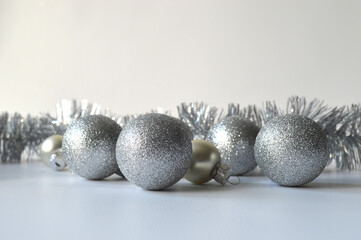 Silver Christmas balls on the table