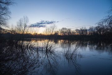 Fototapeta premium sunset over the river