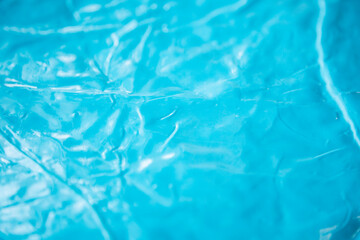 blure selective focus water turquoise blue creased abstract background