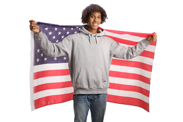 Young african american man holding a USA flag and smiling