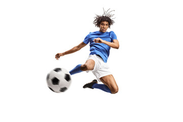 Fototapeta na wymiar African american football player jumping and kicking a ball