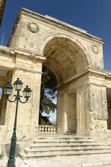 Fototapeta premium Corfu town, Corfu island, Greece- Classical Romanesque arch and part of the exterior decor of the Asian art museum in Spring.