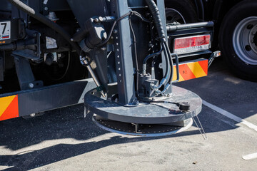 Fototapeta premium Sand, reagent and salt spreader mechanism on special vehicle. Back part of maintenance service truck