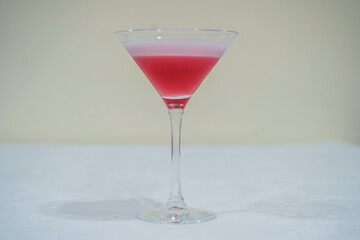 red cocktail in a glass