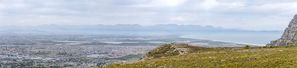 Fototapeta na wymiar aerial cityscape with southern neighborhoods on False Bay, from Silver Mine, Cape Town