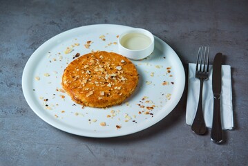 Kunafa dessert served in dish isolated on grey background top view of bahrain food