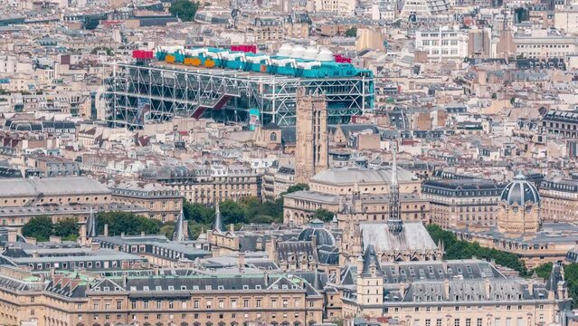 Top view of Paris skyline from above timelapse. Main landmarks of european megapolis with domes and spires. Bird-eye view from observation deck of Montparnasse tower. Paris, France