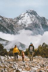 Family travel hiking in Albania enjoying mountain view mother and father with child outdoor active healthy lifestyle vacations eco tourism in Llogara park