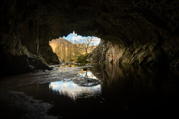 View looking out of Rydal Cave near Grasmere in the Lake District National Park, UK. - 585886994