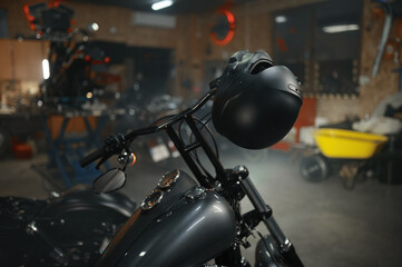 Motorbike parked in biker garage or service motor shop