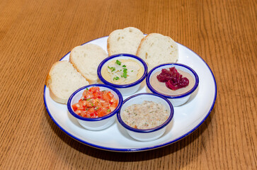 pieces of bread with different types of sauce