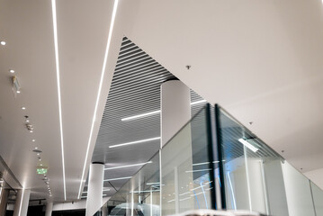 Obraz premium stainless steel railings and glass wall in modern building interior