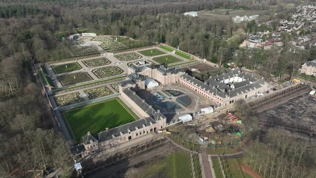 Get a bird's eye view of the impressive Dutch Royal Palace, Paleis Het Loo, with its symmetrical gardens and ornate architecture.