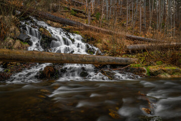 Karlova Studanka waterfall in Jeseniky mountains in spring morning