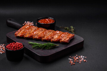 Delicious fresh grilled or smoked ribs with salt, spices and herbs
