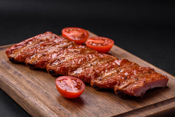 Delicious fresh grilled or smoked ribs with salt, spices and herbs