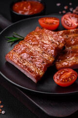 Delicious fresh grilled or smoked ribs with salt, spices and herbs