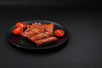 Delicious fresh grilled or smoked ribs with salt, spices and herbs