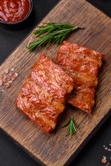 Delicious fresh grilled or smoked ribs with salt, spices and herbs