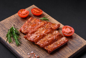 Delicious fresh grilled or smoked ribs with salt, spices and herbs
