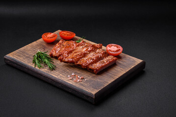 Delicious fresh grilled or smoked ribs with salt, spices and herbs