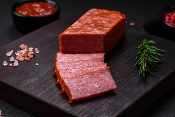 Delicious fresh sausage salami with salt, tomatoes and spices