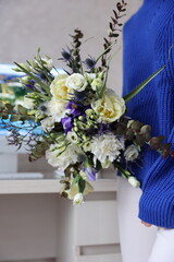 a beautiful spring bouquet in white and blue tones
