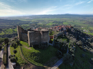 aerial view of the medieval castle of the village of scarlino tuscany