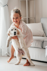 toddler girl play with puppy dog golden retriever,kids emotion mental health friends love tightly cuddle vertical,play hugging dog puppy © Maria