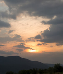 Sunset over the town of Sarnitsa, located in the Western Rhodope Mountains near the Dospat Reservoir.