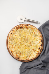 Four cheese pizza on a white isolated background