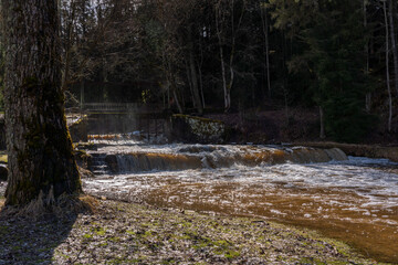 Fototapeta premium In Lavia, the Vaive river is very small, but fast, only 18 kilometers long