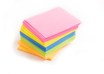 multi-colored sheets for records in the office. shadow, close-up. the background is white