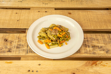 Menestra is a typical Spanish stew made with a variety of vegetables, generally those available in the garden during the season