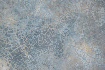 Gray blue brown beige abstract grunge background. Cracked concrete floor. Dusty blue color. Dirty rough surface texture. Old, damaged. Close-up.