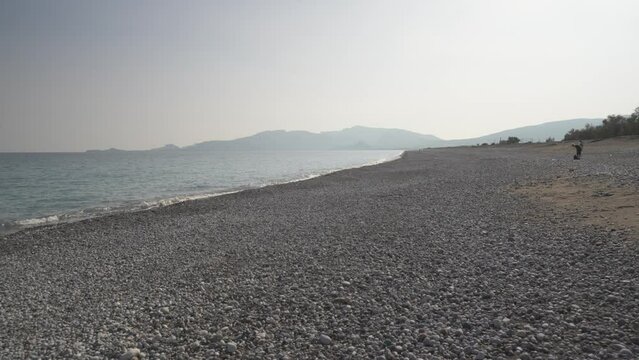 Paralia Massari Beach and Lindos in background, Rhodes, Dodecanese Islands, Greek Islands, Greece, Europe