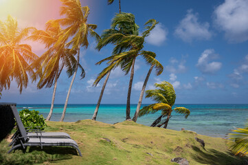 Obraz na płótnie Canvas Sunbed on tropical beach