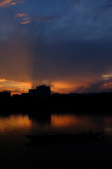 sunset with shadow of buildings