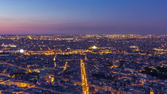 Panorama of Paris after sunset day to night transition timelapse. Top aerial view from observation deck of montparnasse building in France. Colorful sky at summer day