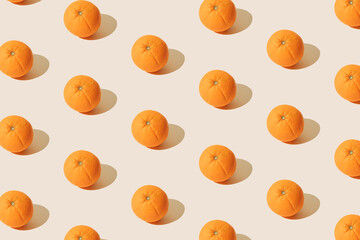 Arranged orange on a white background. Pattern.