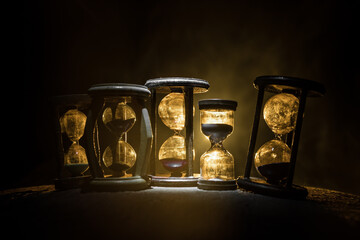 Hourglass as time passing concept for business deadline, urgency and running out of time....