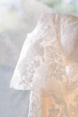 Fototapeta na wymiar Detail of a bride's wedding dress, made of lace 