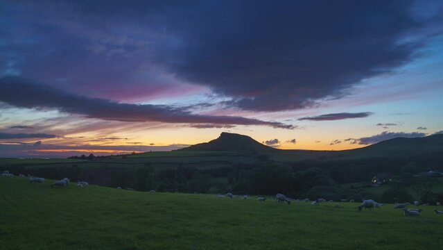 A time lapse of farmland with Roseberry Topping in the distance. North York Moors National Park, England