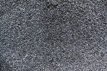 Top view of black seeds, spices food texture and background