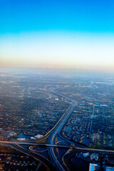 Fototapeta na wymiar aerial view of highway with city