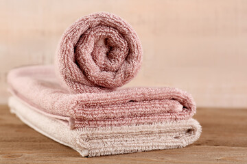Fototapeta na wymiar Clean cotton towels on wooden table