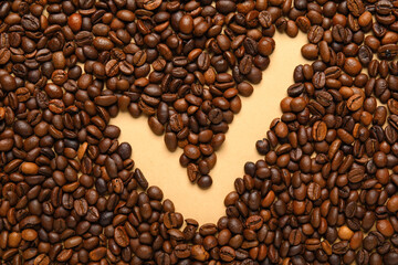 Check mark made of coffee beans on beige background