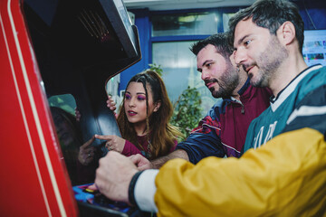 Friends Enjoying Retro Arcade Game